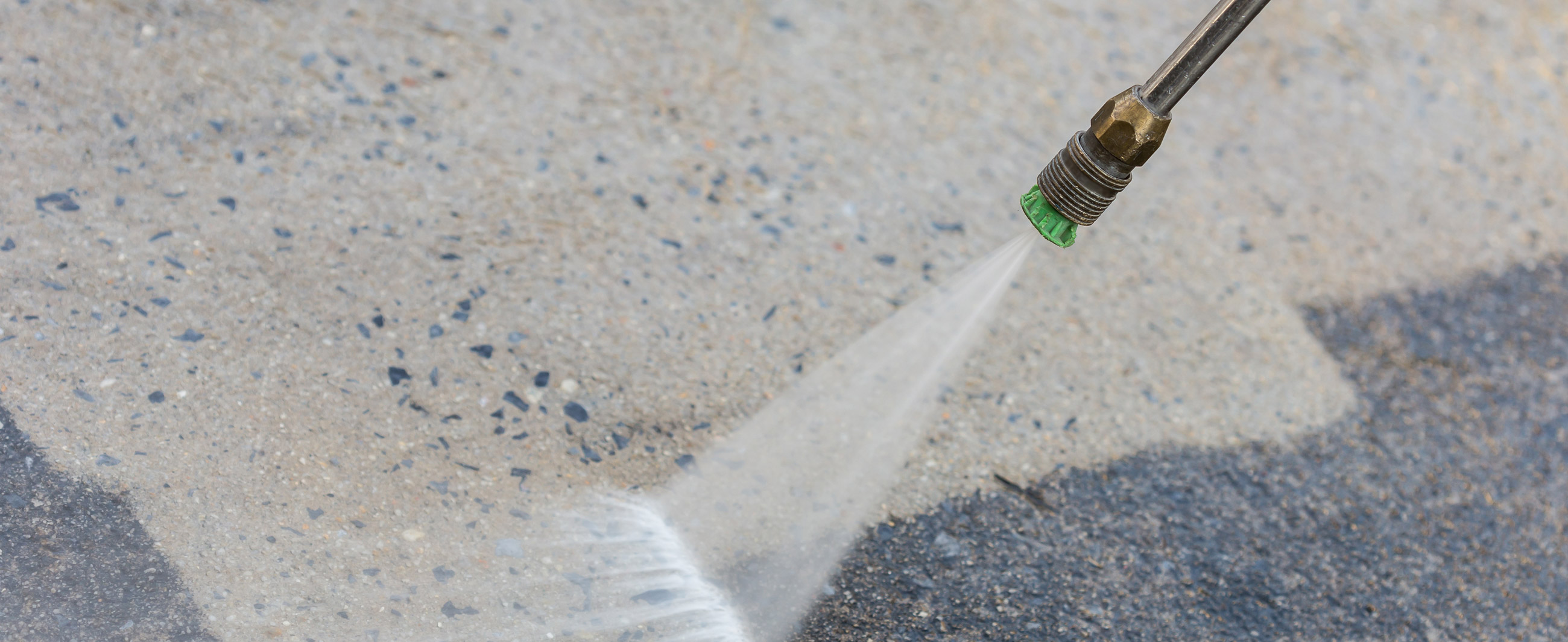 Power Washing Close up on concrete